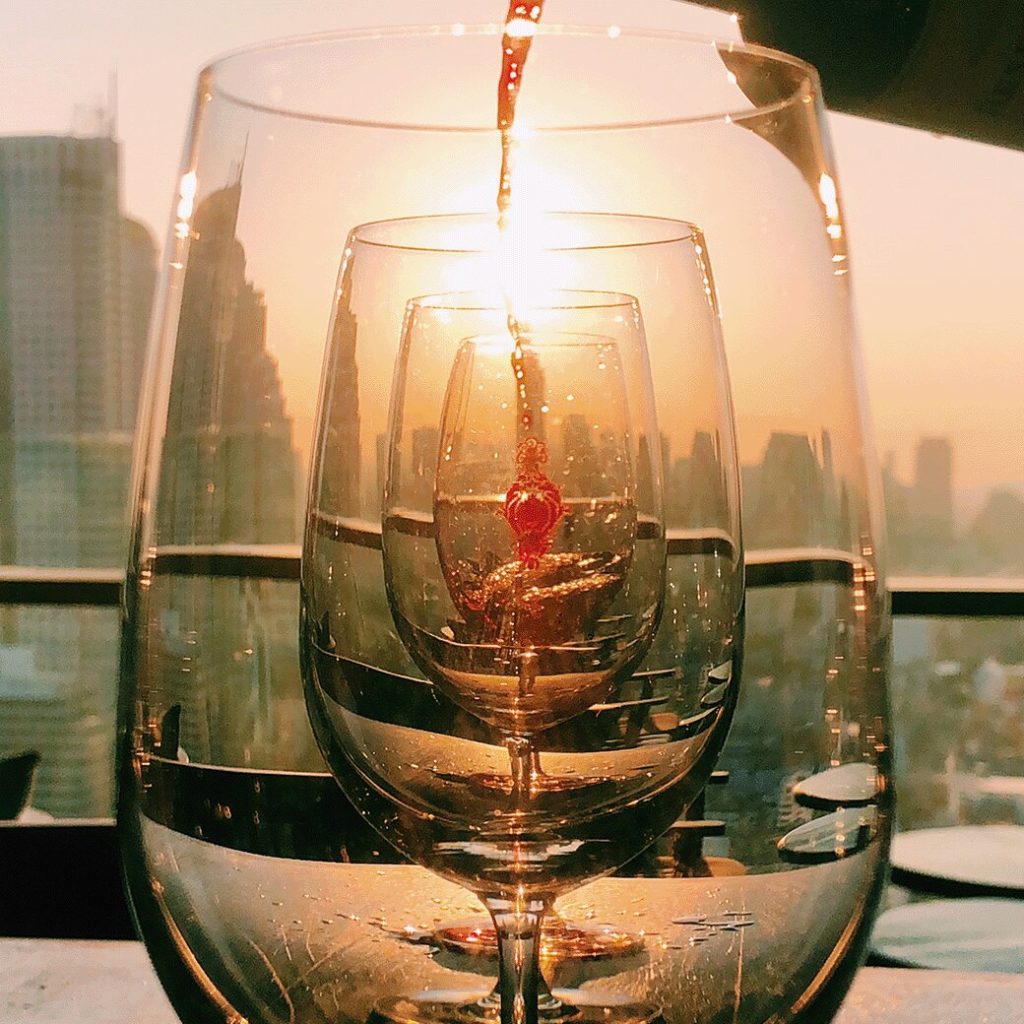 Happy hour during sunset at Scarlett Bangkok with french wine.